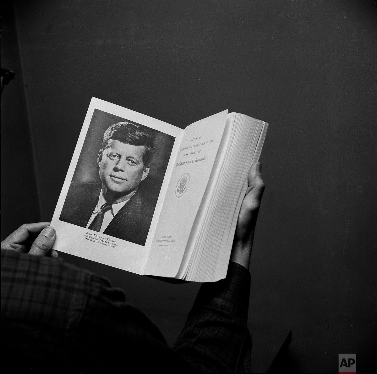 OTD in 1964, the government publicly released the report of the Warren Commission, which concluded that Lee Harvey Oswald had acted alone in assassinating President John F. Kennedy. Photo shows the inside cover of the Warren Commission report, a two-inch thick, 888-page report.