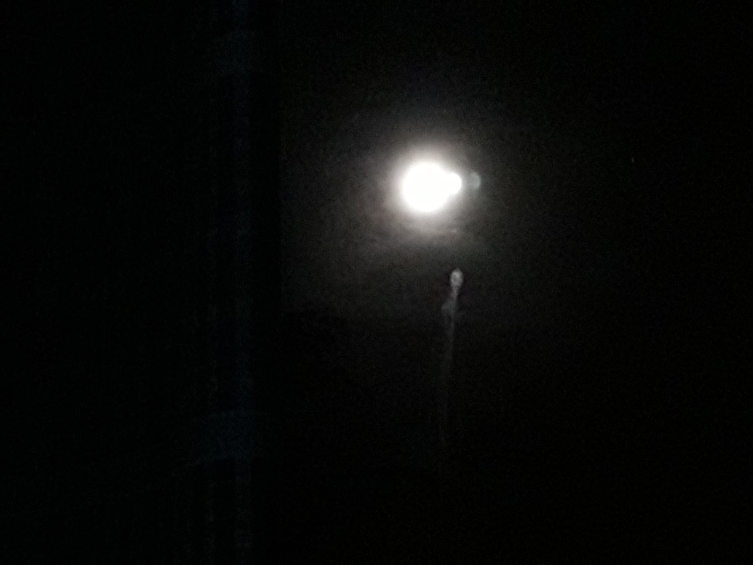 I tried to take a photo of the moon last night and accidentally caught something wtf is this !?