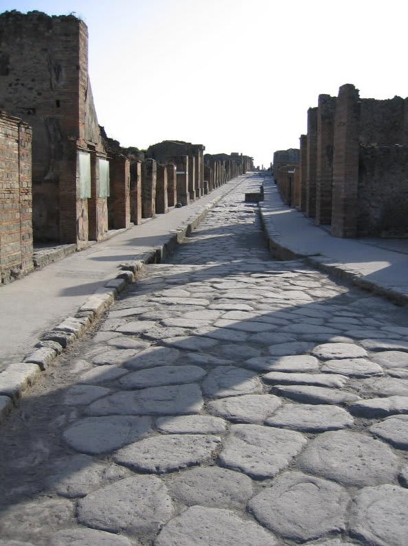 Raised sidewalk beside a 2000-year-old paved road, Pompeii, Italy