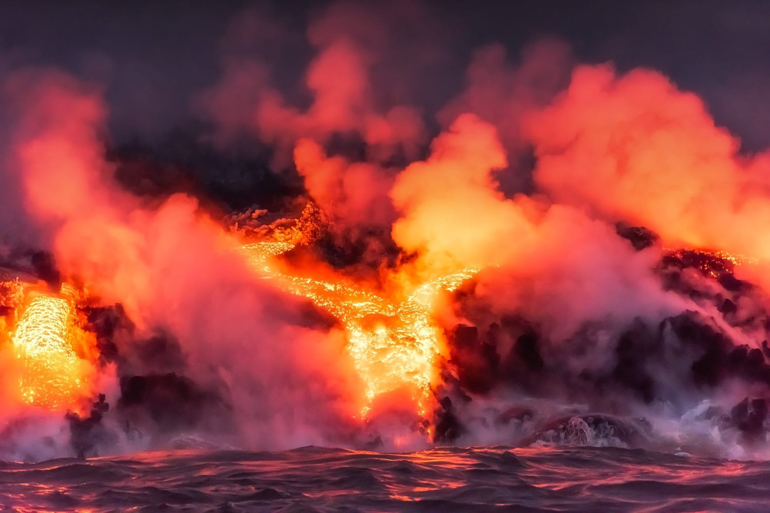 Rivers of lava entering the Pacific as Kilauea erupts by Mike Mezeul II