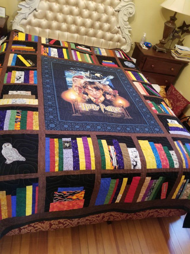 My grandma made this Harry Potter bookshelf quilt for me. It is beyond words! I love it!