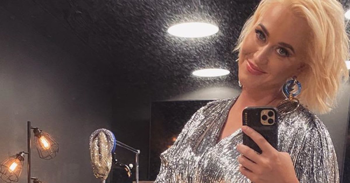 That Glow! Pregnant Katy Perry Cradles Growing Baby Bump in Silver Dress