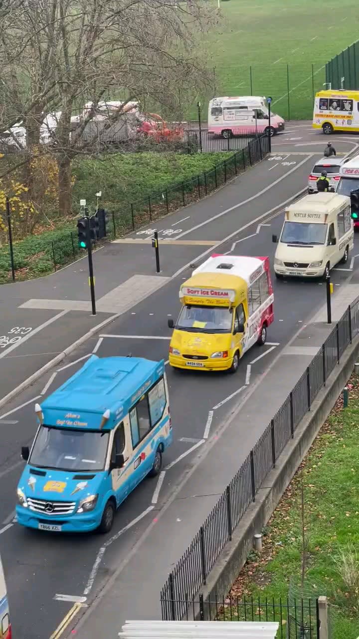 An ice cream man's funeral, with ice cream vans following in solidarity.