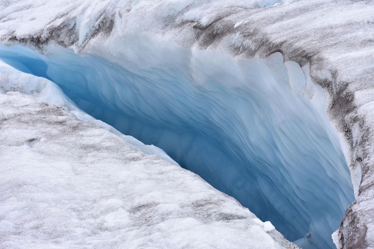 A crevasse in the glaciers of the Antisana volcano in Ecuador, about 60 ...