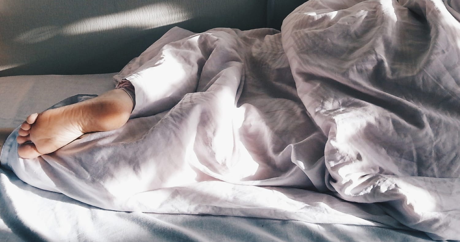 The Secret To Getting A Good Night's Sleep When Sharing A Bed