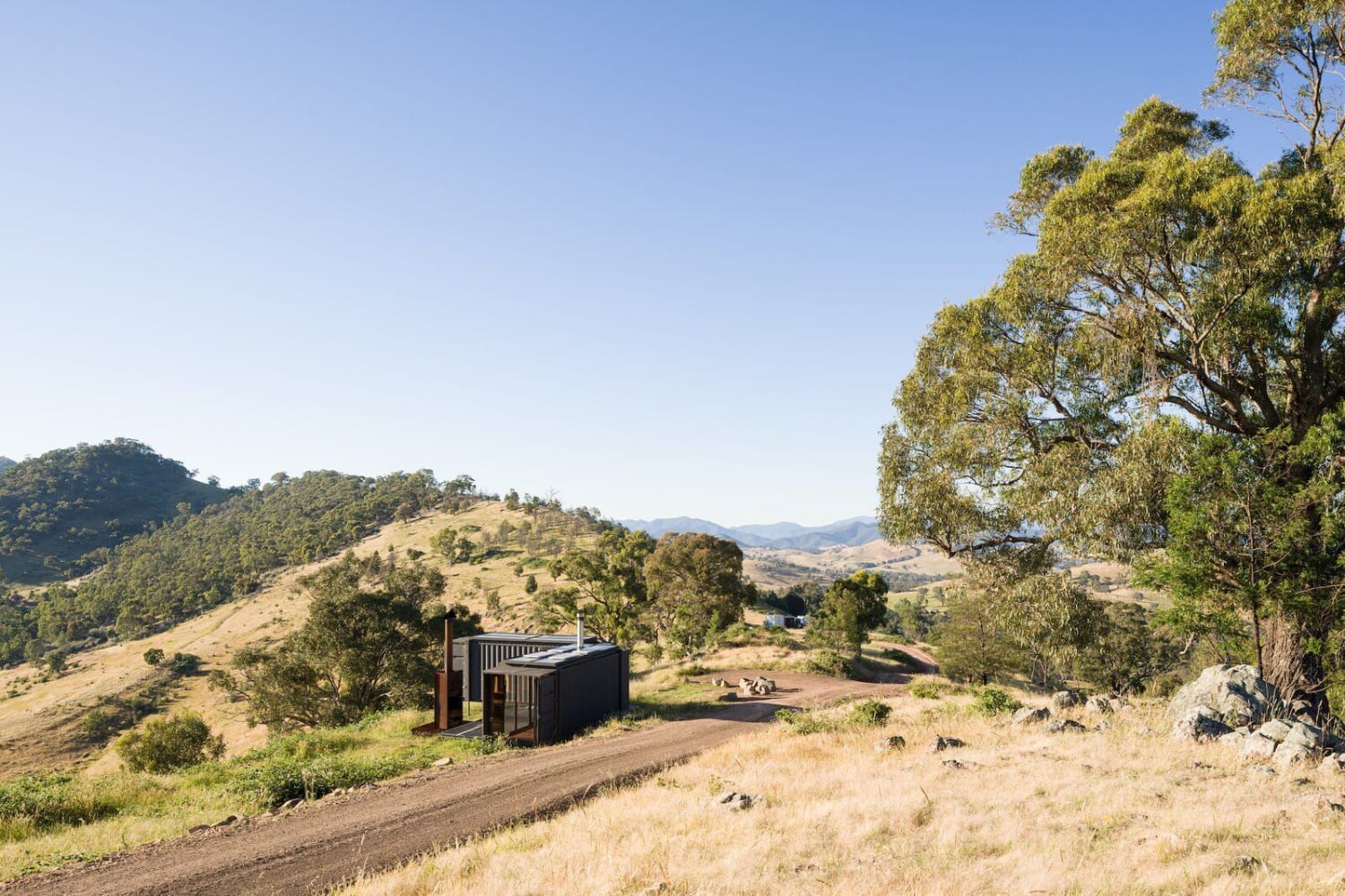 An Off-Grid Shipping Container Home Perches at the Foothills of the Victorian Alps