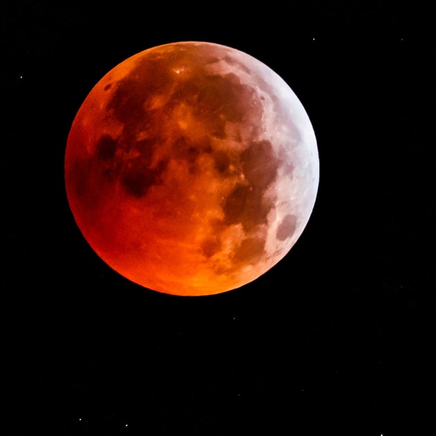 Stunning photos show the super blood moon in all its glory