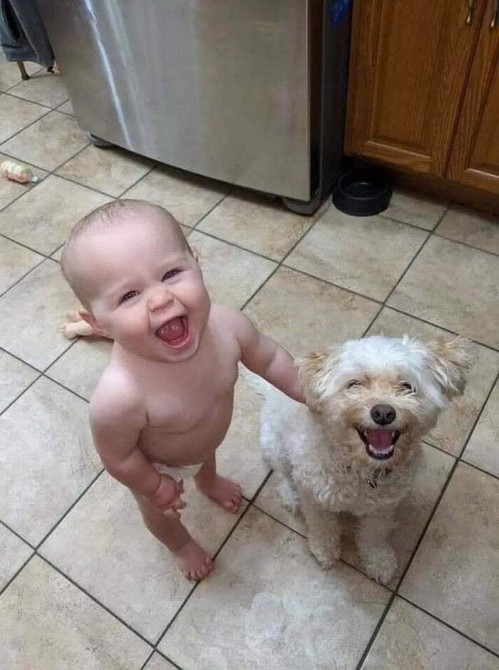 His mother posted this photo and wrote, "I don't know which one is happier to have the other.