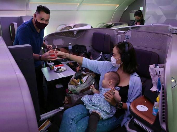 Travel-starved 'passengers' dine on parked Singapore Airlines jet
