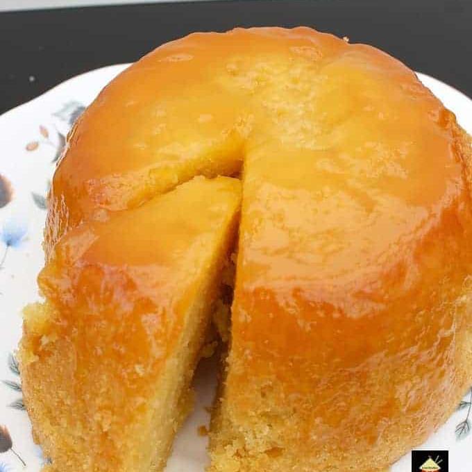 Lemon Steamed Cake or pudding is a lovely soft and fluffy cake steamed on the stove top, steamer or multicooker.