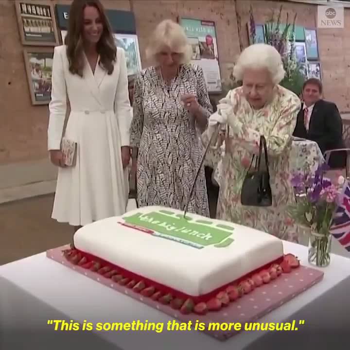 Queen Elizabeth II insisted on cutting a cake using a ceremonial Sword at an event on the sidelines of the G7 Summit
