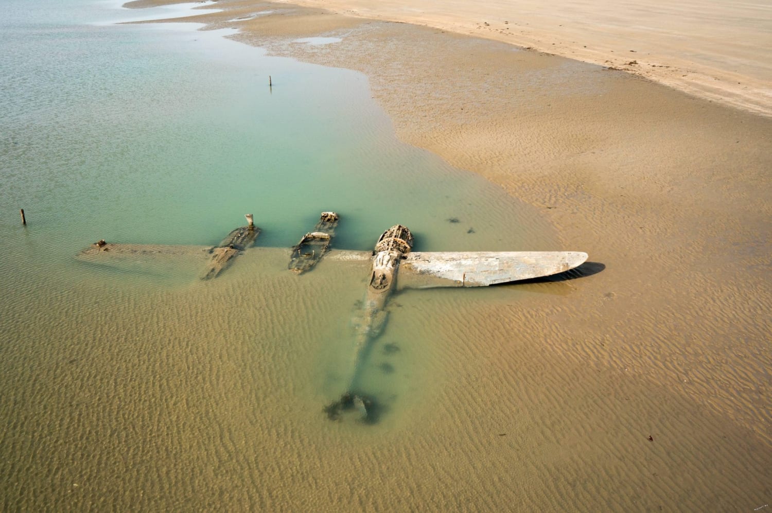 Abandoned P-38 on a beach in Wales.