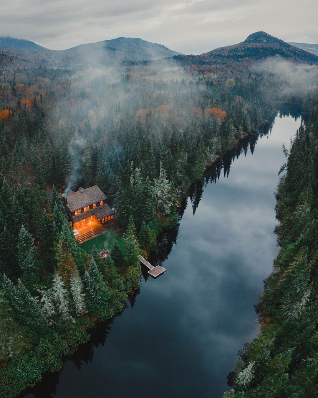 Remote cabin next to Rivière-du-Diable flowing through Mont-Tremblant in the Laurentian Mountains of Quebec, Canada.