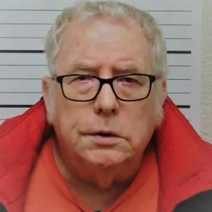 Ex-trainer accused of sexually abusing 100 boys is charged with child porn possession