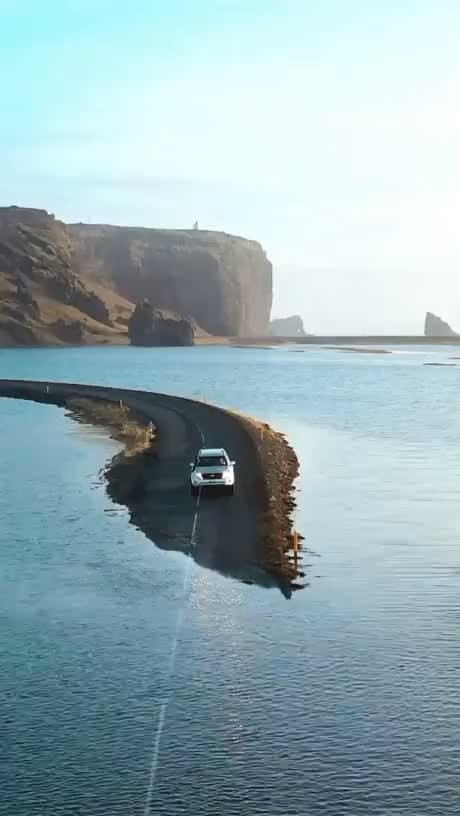 Driving through this flooded road in Iceland