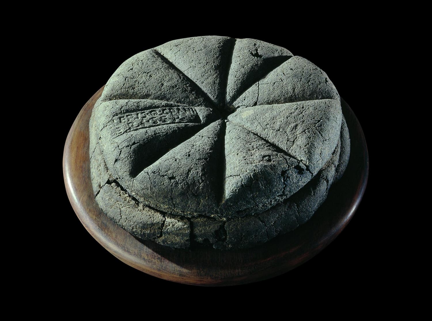 2000-year old bread from Pompeii that got preserved when Mount Vesuvius erupted