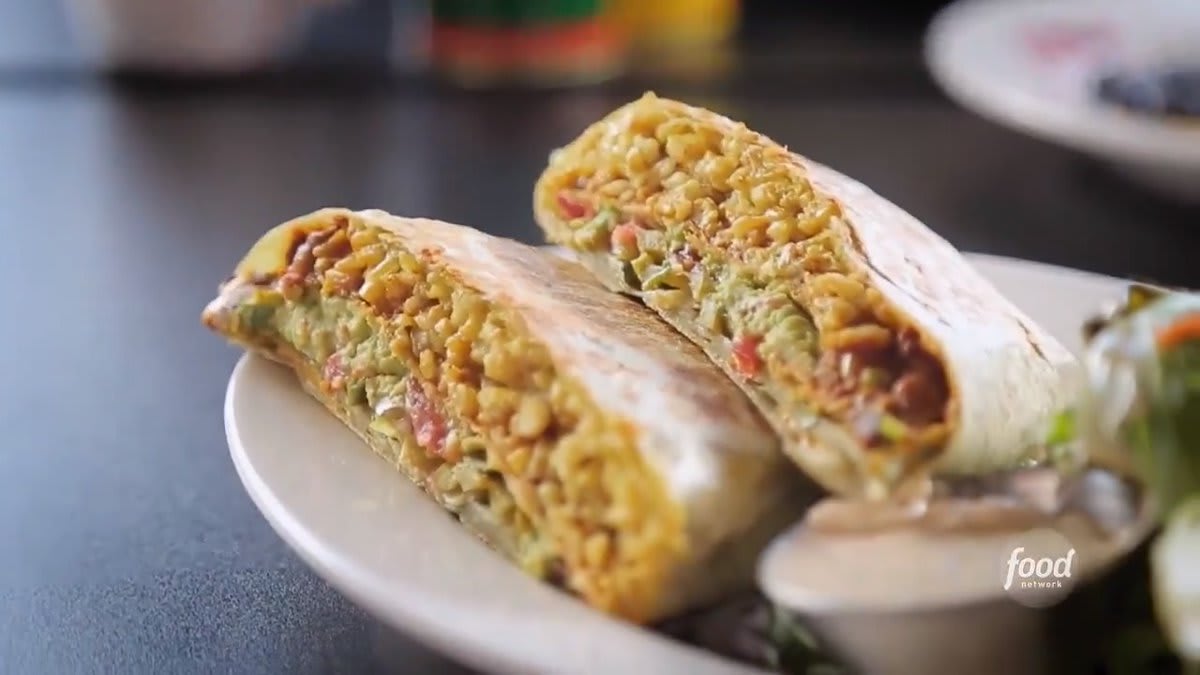 "The crunchwrap is this ooey, gooey mess of awesomeness," one customer says. The twist? It's all VEGAN. Find it at @pingalacafe! Watch DDD, Fridays at 9|8c + subscribe to @discoveryplus to stream more: