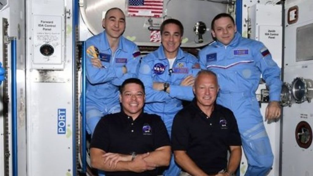 Astronauts on historic mission enter space station