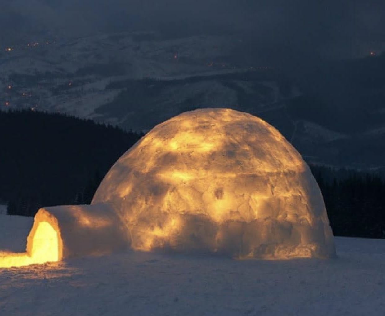 This is what an igloo looks like when you build a fire inside. The fire melts the inner layer of ice, and the cold outside refreezes it- adding a layer of insulation that can keep the igloo at 60° inside while it’s -50° outside