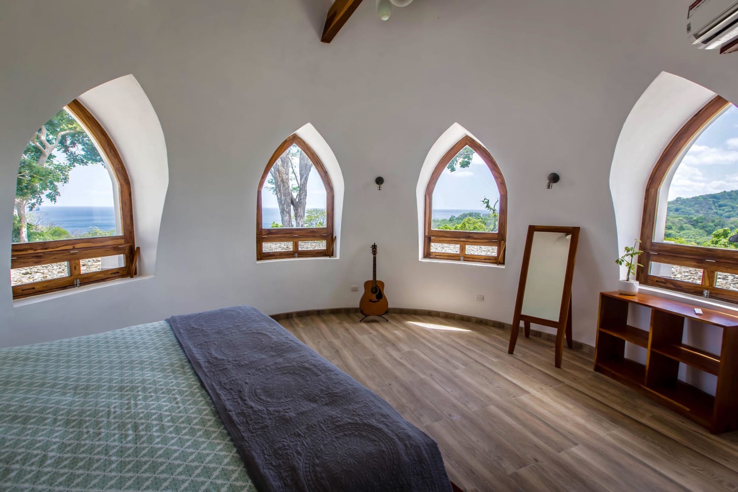 The minimalistic master bedroom of our superadobe dome home in Nicaragua