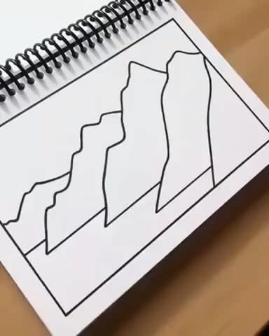 This artist drawing beautiful mountains.