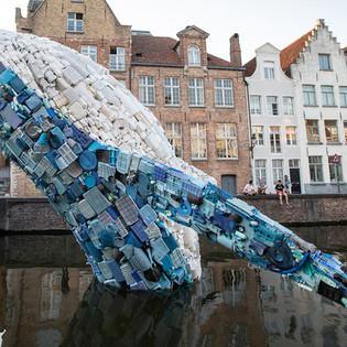Whale made with 10,000 lbs. of plastic waste emerges from canal (Video)