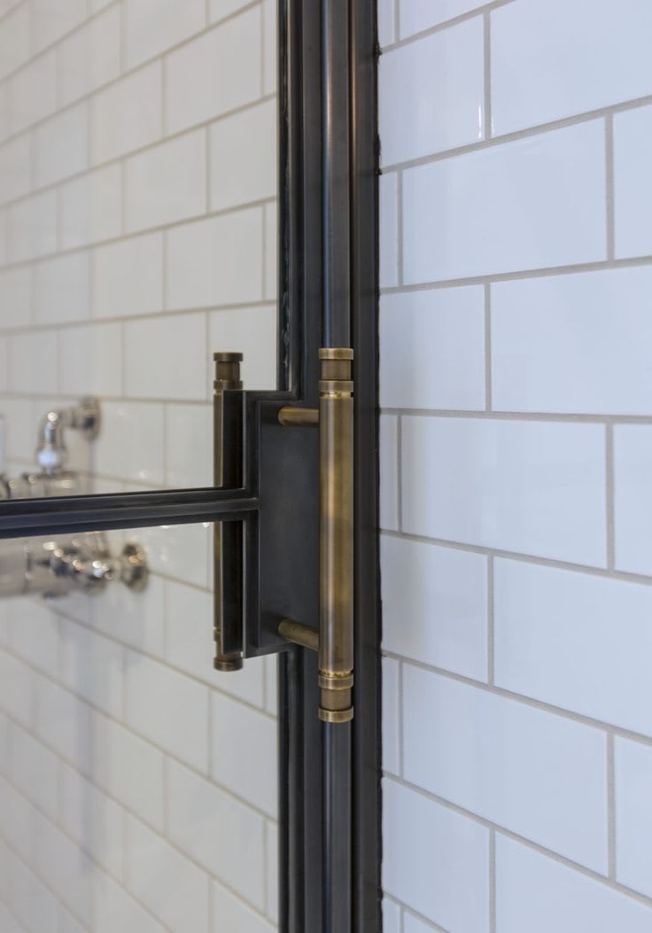 The Frankford Shower Door by Amuneal Manufacturing Corp.