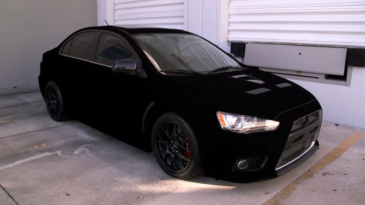 This Impossibly Black Lancer Evolution Uses Special Paint To Break Your ...