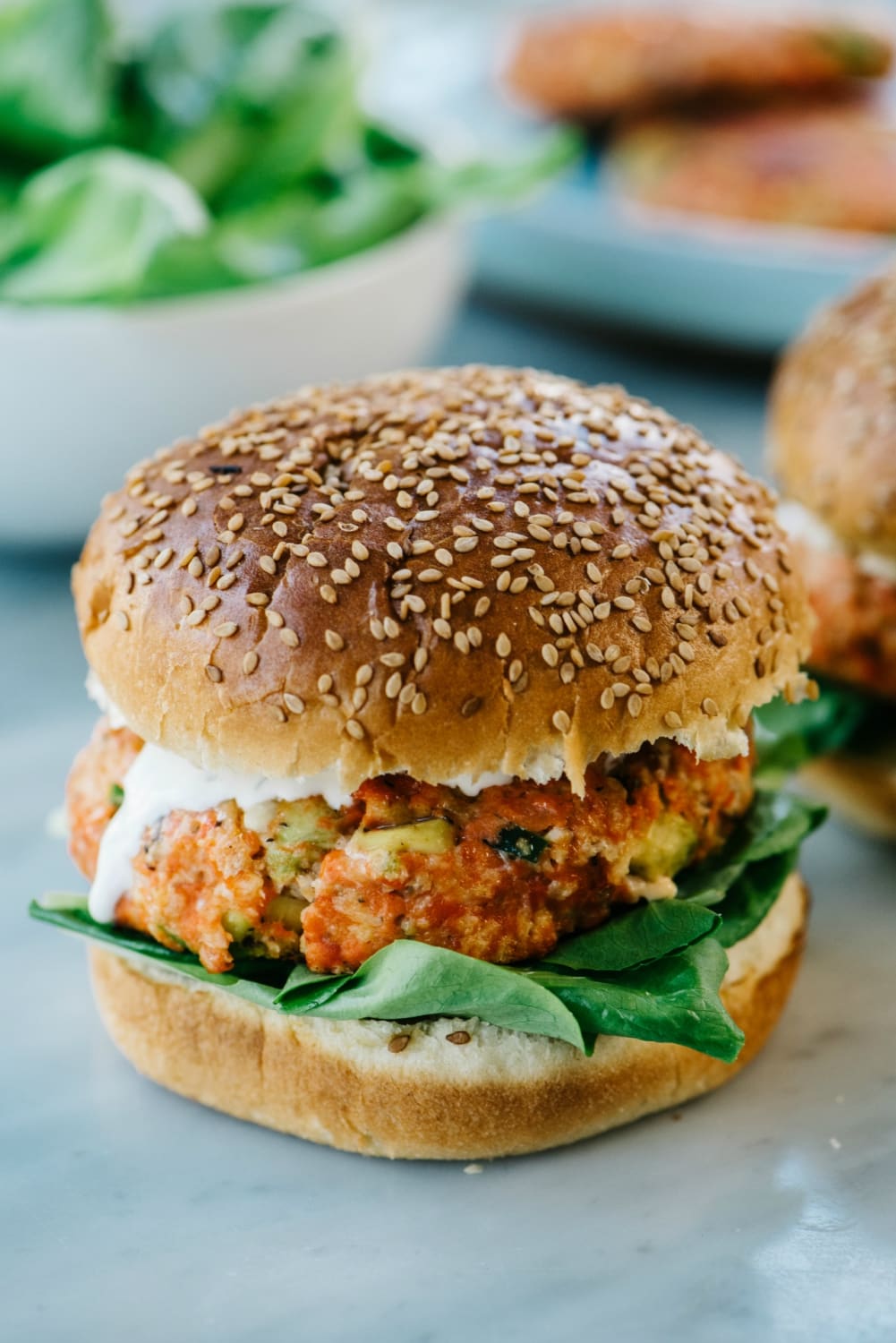 Delicious salmon burgers with avocado are the BEST for summer!
