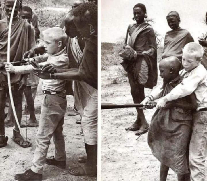 Two boys teaching each other parts of their culture (1962). Photography credit: Robert Halmi.