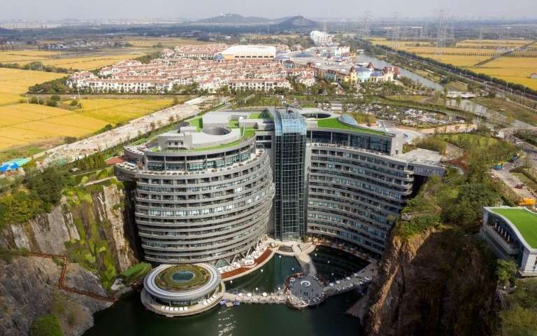 This is the InterContinental Shanghai Wonderland, a hotel built into the side wall of an abandoned quarry