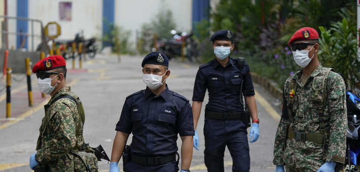 Malaysia Arrests Thousands Amid Coronavirus Lockdown