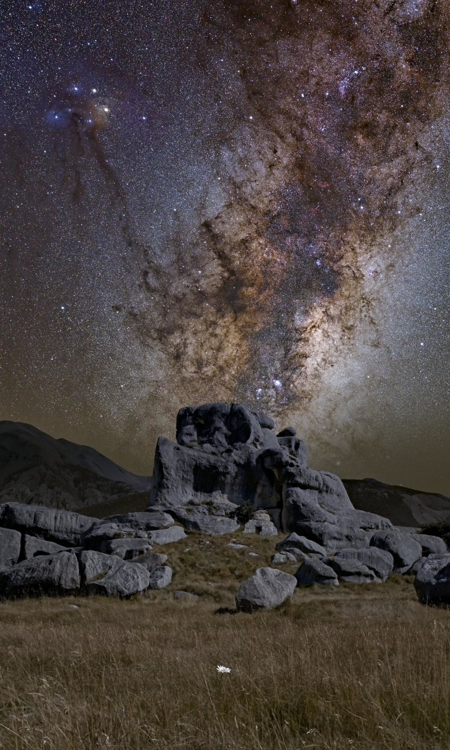 The galactic core rising over the limestone tors of Kura Tāwhiti, New Zealand