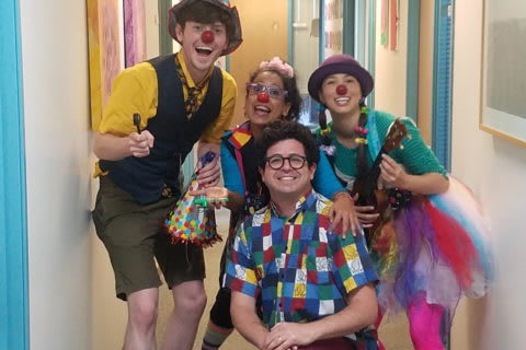 trained medical clowns believe laughter can bring foster families together