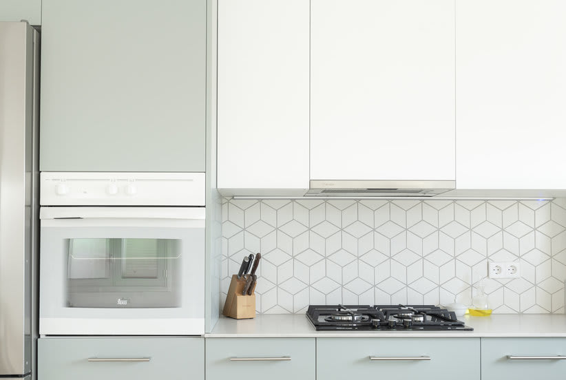 How to Clean Kitchen Cabinets So the Entire Room Will Shine