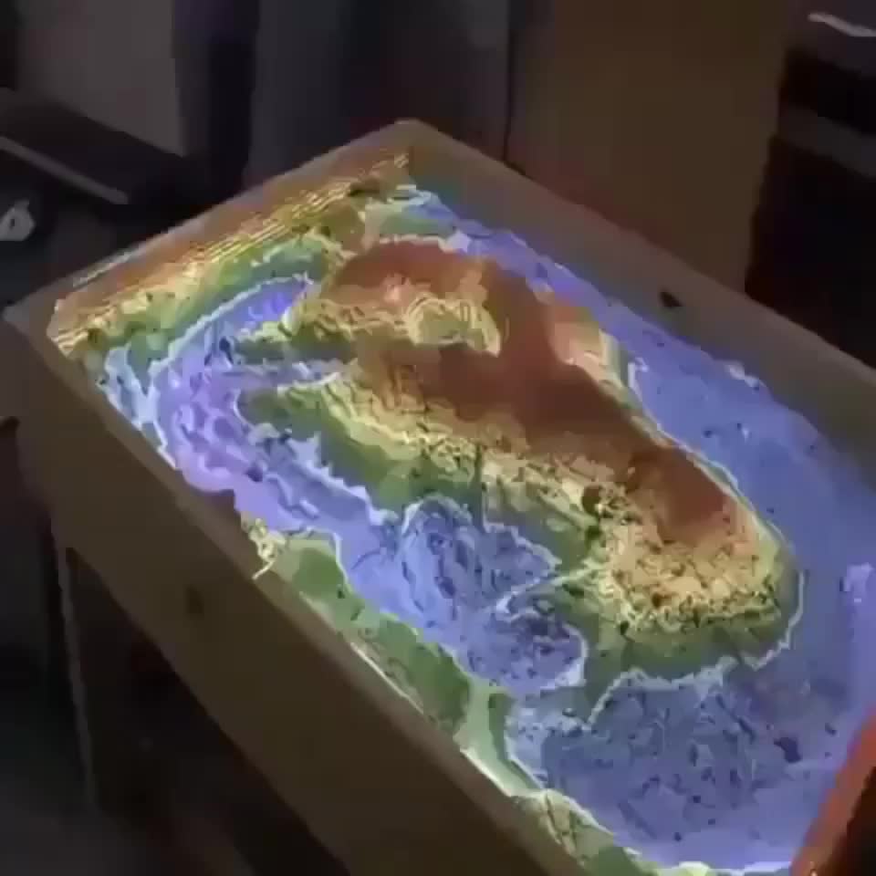 This Augmented reality sandbox allows you to interact with topographic maps