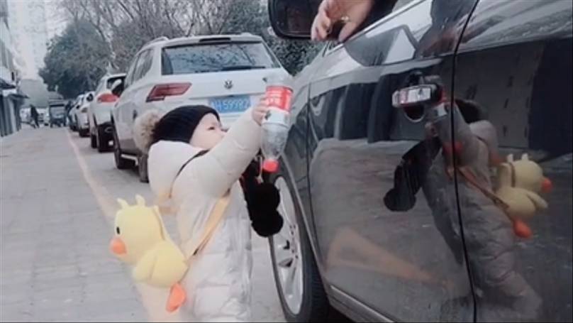 Toddler Hands Back Empty Bottle After Litter Bug Chucks It From Car