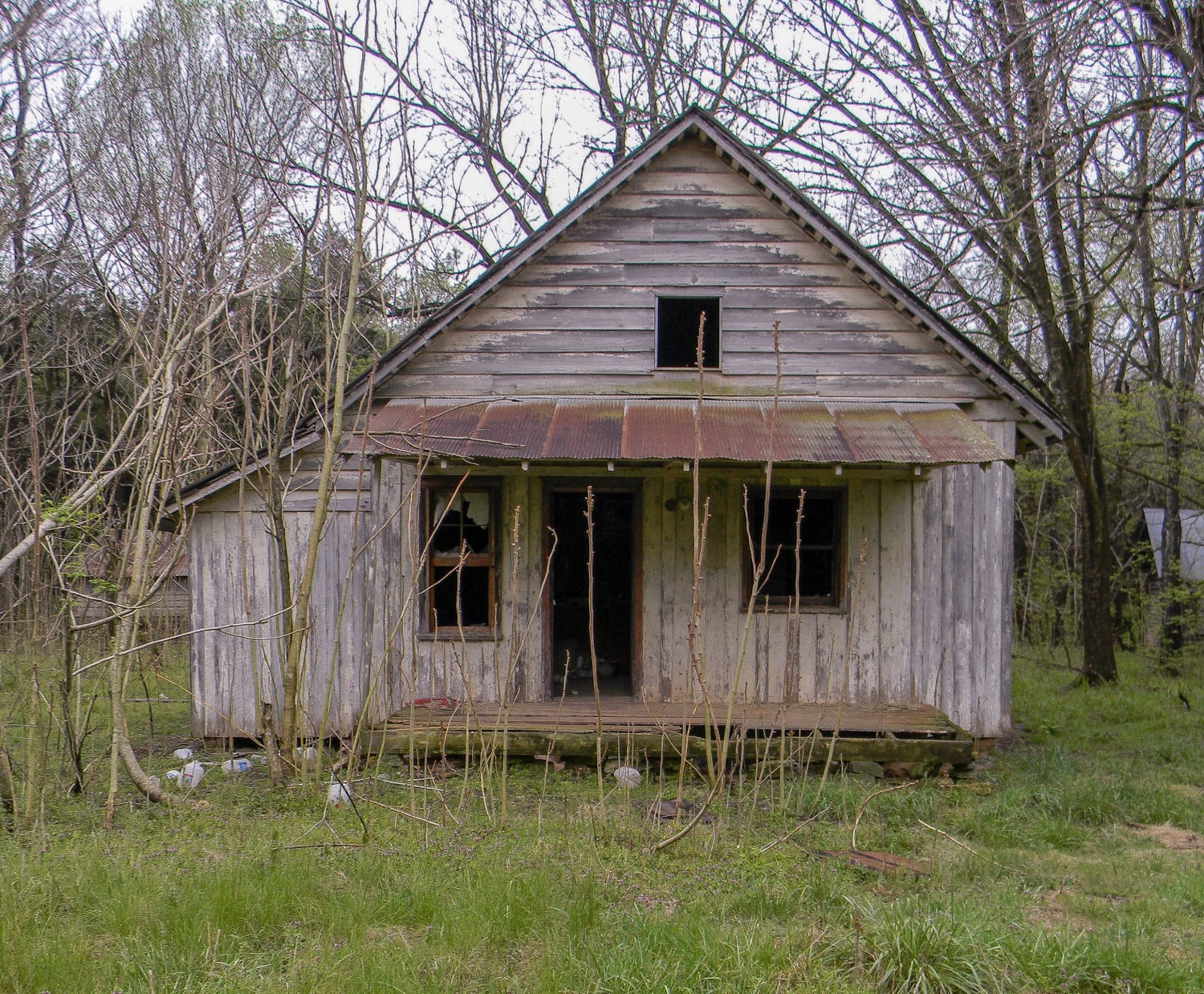 Creepy abandoned cabin in the middle of the woods, abandoned since 2003 or longer. Took this in February, 2018. Will upload interior shots whenever I find them.