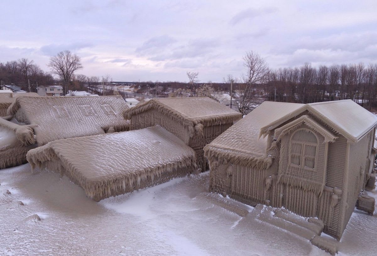 Totally encased in ice, homes along Lake Erie look surreal