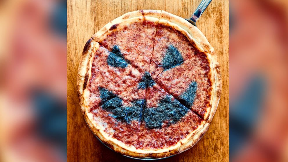 This sparkly, jack-o'-lantern pizza is all you need this Halloween