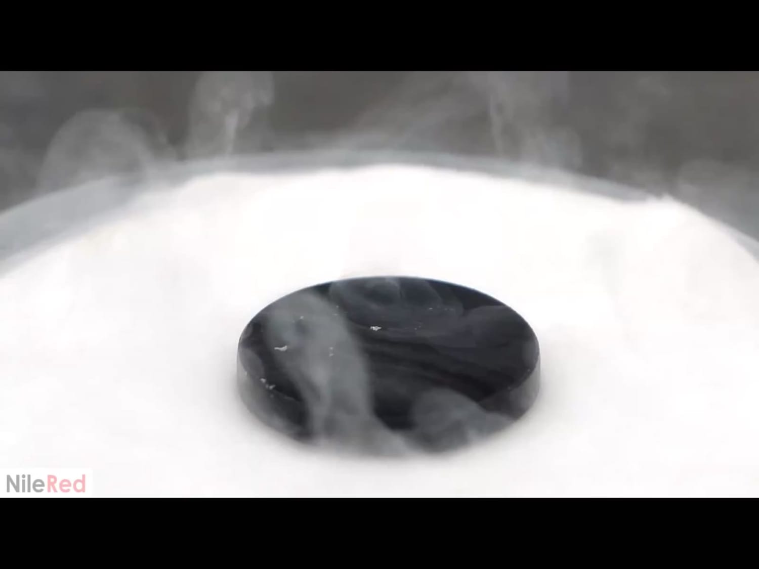 This magnet levitating because of the super conductor