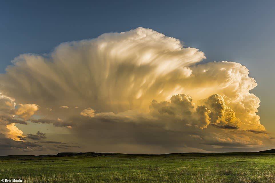 A cumulonimbus cloud at sunset in Oglala South Dakota. Taken by Eric Meola.