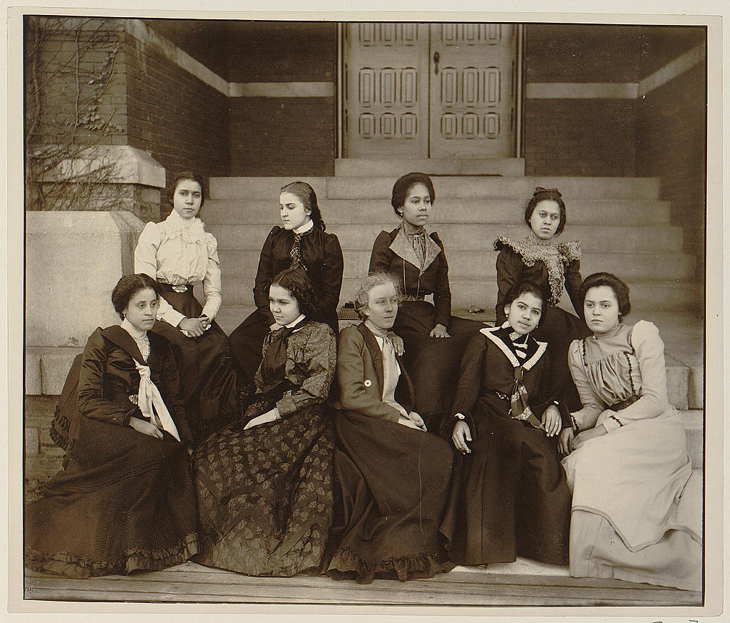 "Nine African American women, full-length portrait, seated on steps of a building at Atlanta University, Georgia" (1899 or 1900)