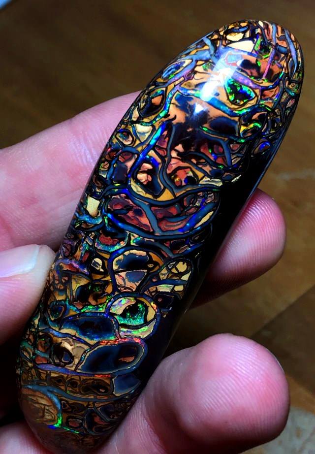 Incredible Koroit Boulder opal from Queensland, Australia that looks like an ancient rune!