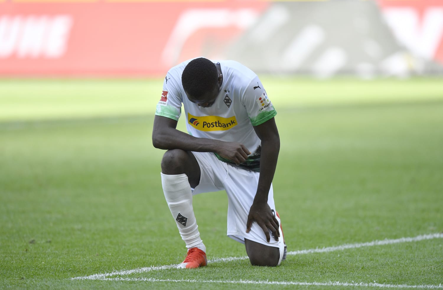 Marcus Thuram celebrates goal by taking a knee in Bundesliga as protests continue