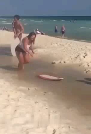 Wcgw jumping on a moving surfboard.