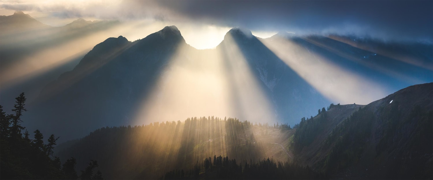 Amazing light rays just after sunrise during a short backpacking trip in the North Cascades, Washington
