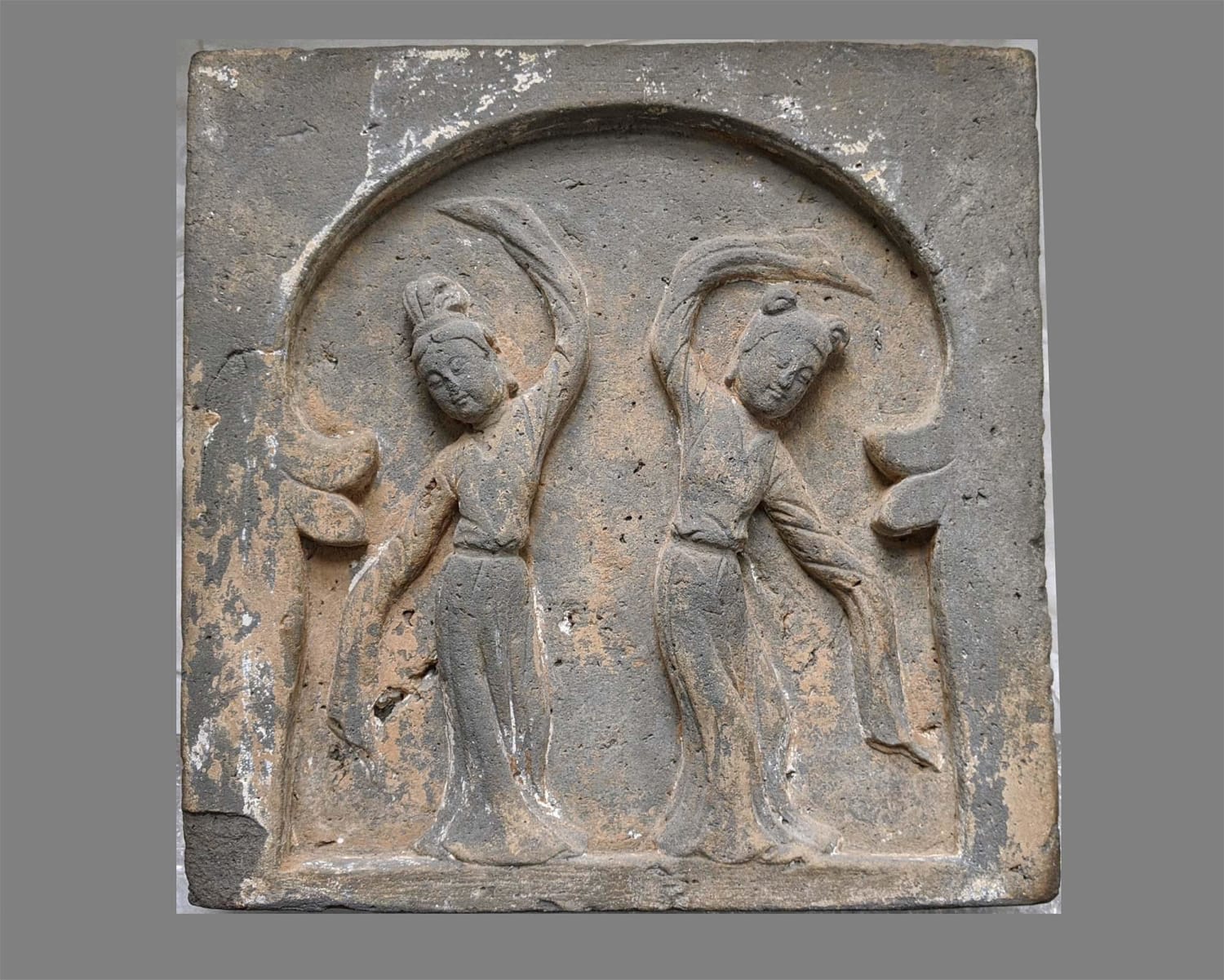 Terracotta Plaque of Elegant Dancers, Chinese, Tang Dynasty (618-907 CE) 12...3 inches. Private Collection