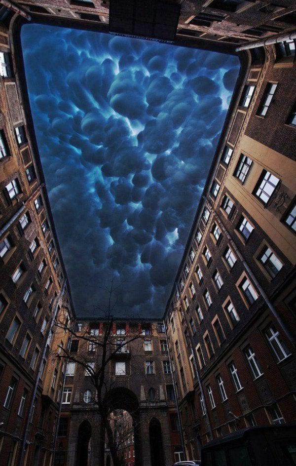 Wild clouds over building