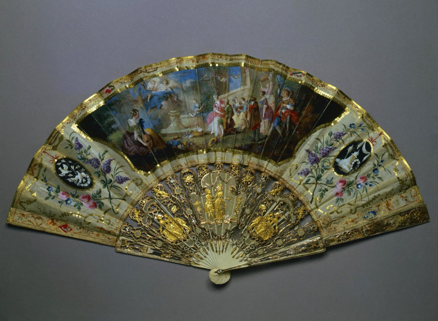 Folding Fan Showing the Painting of Alphonse Giroux "Altar of Love", Unknown craftsman, 1770s, England. Materials: ivory, paper, gouache, sequins